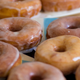 Row of freshly glazed donuts